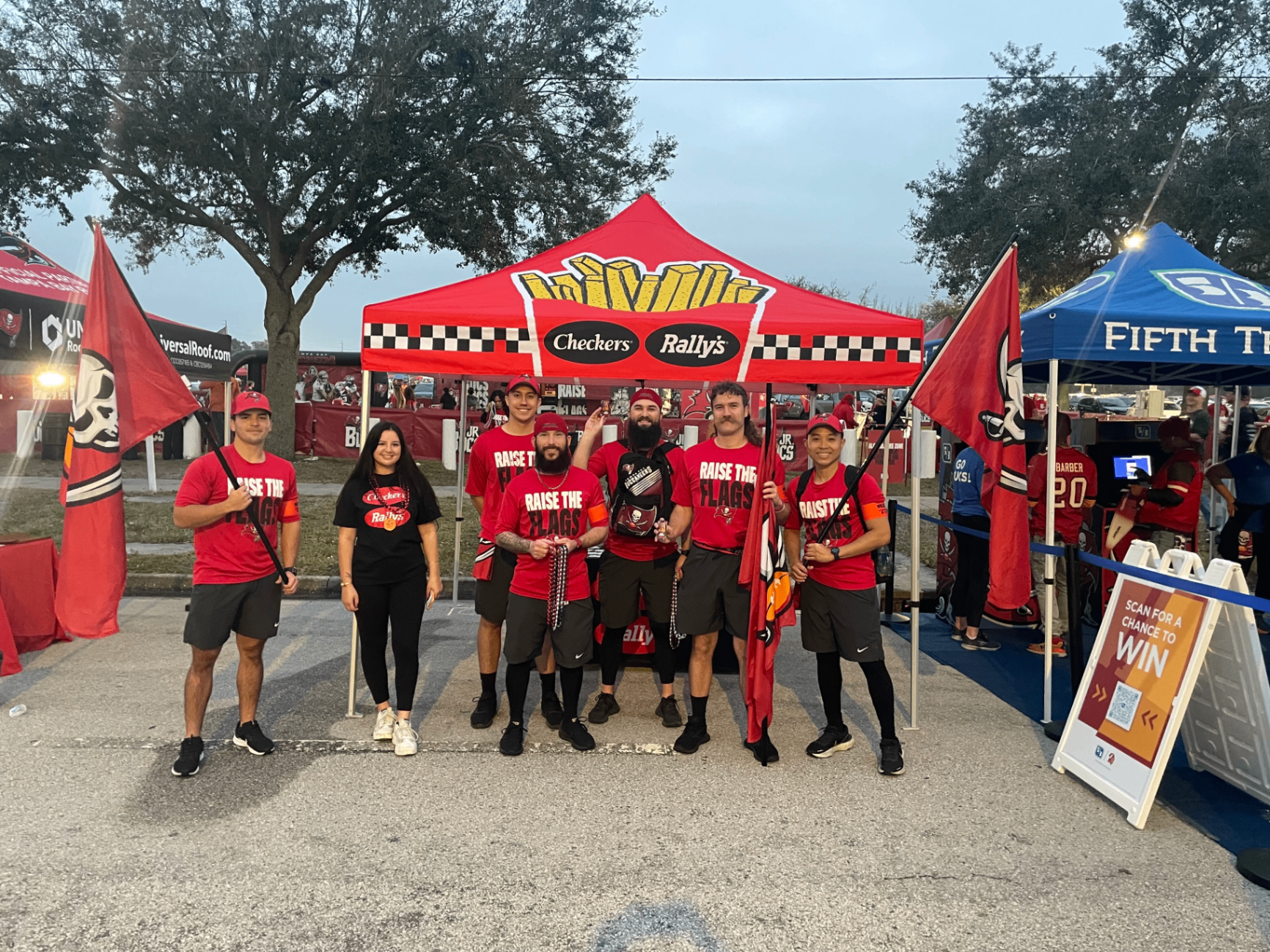 Checkers & Rally's stadium activation with branded tent and team